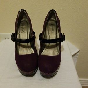 Purple snake print heels with black strap.